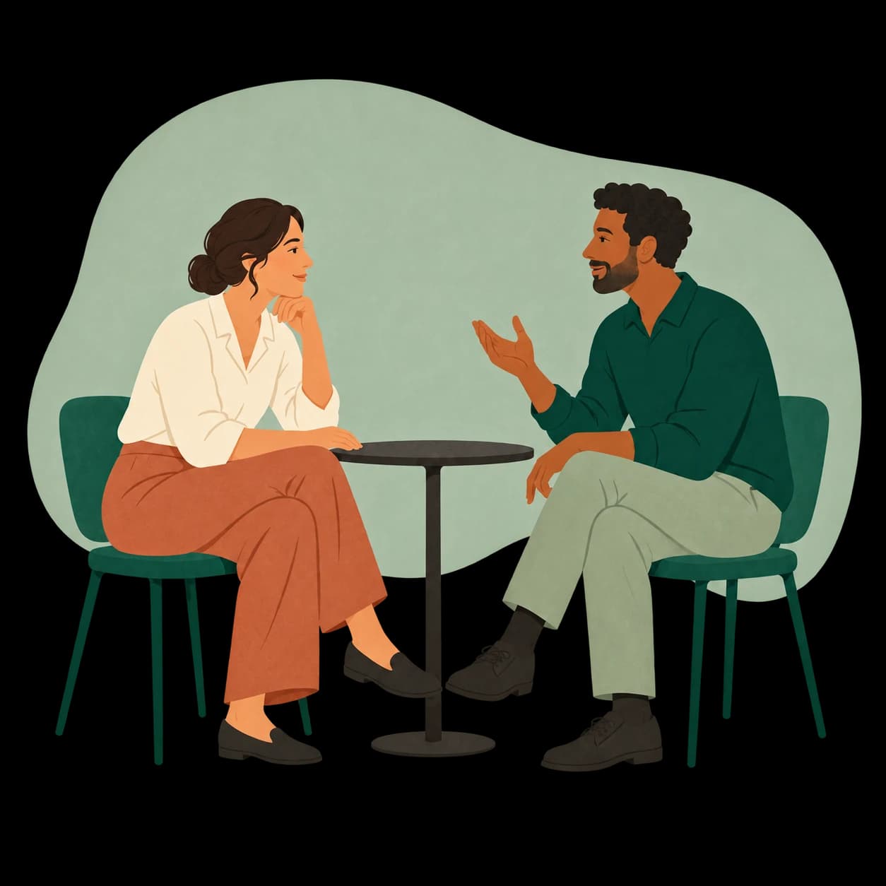 Two colleagues making time to listen and support each other in a one-to-one conversation.